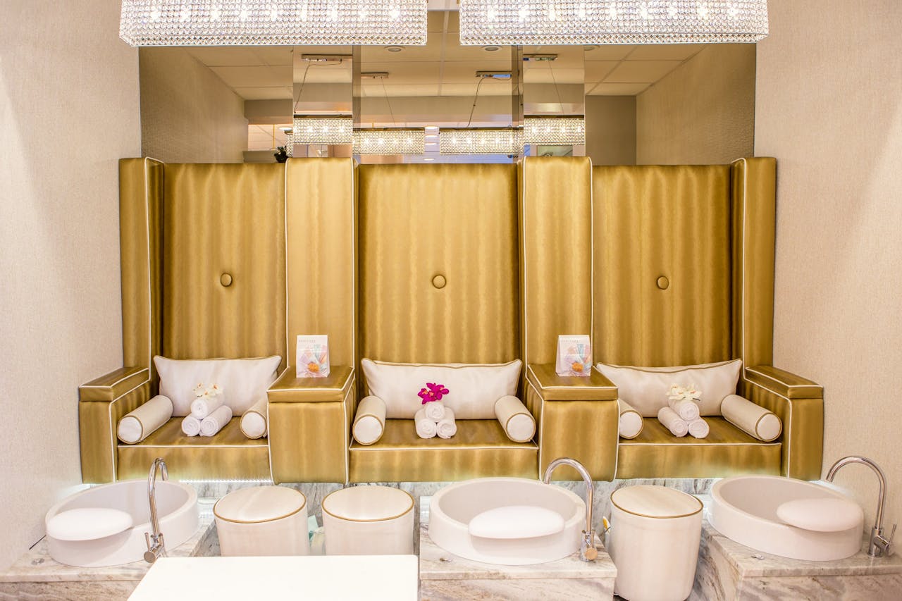 why-choose-us Elegant and contemporary spa interior featuring luxurious pedicure stations for relaxation.